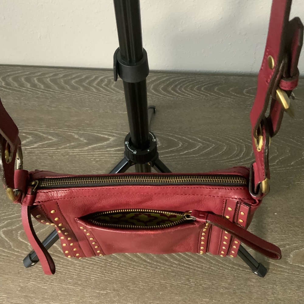 orYany Maroon Pebbled Leather Studded Crossbody - Picture 2 of 12